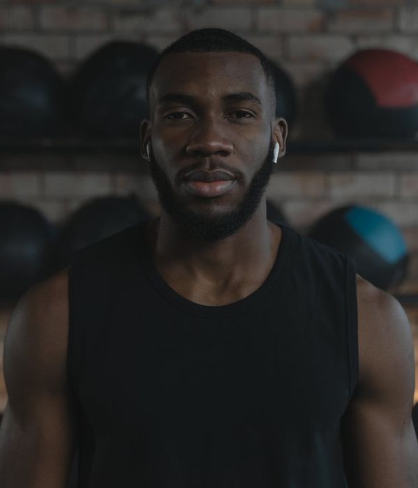 Athlete in a state of focus after a workout, looking determined.